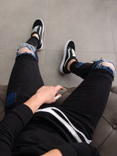 Load image into Gallery viewer, Blue Patches Ripped Jeans
